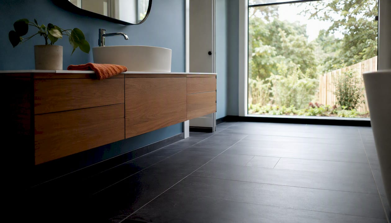 Modern minimalist bathroom with floating vanity and glass shower